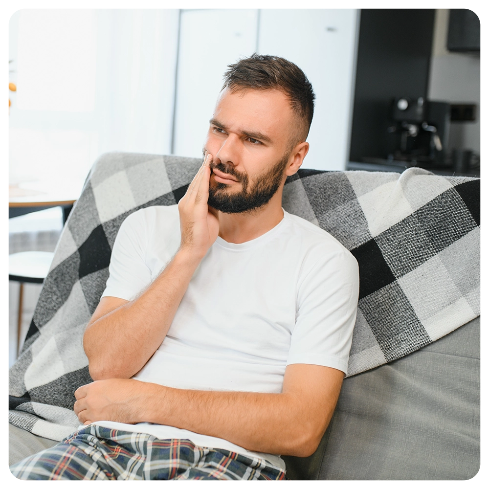 Young man losing a tooth