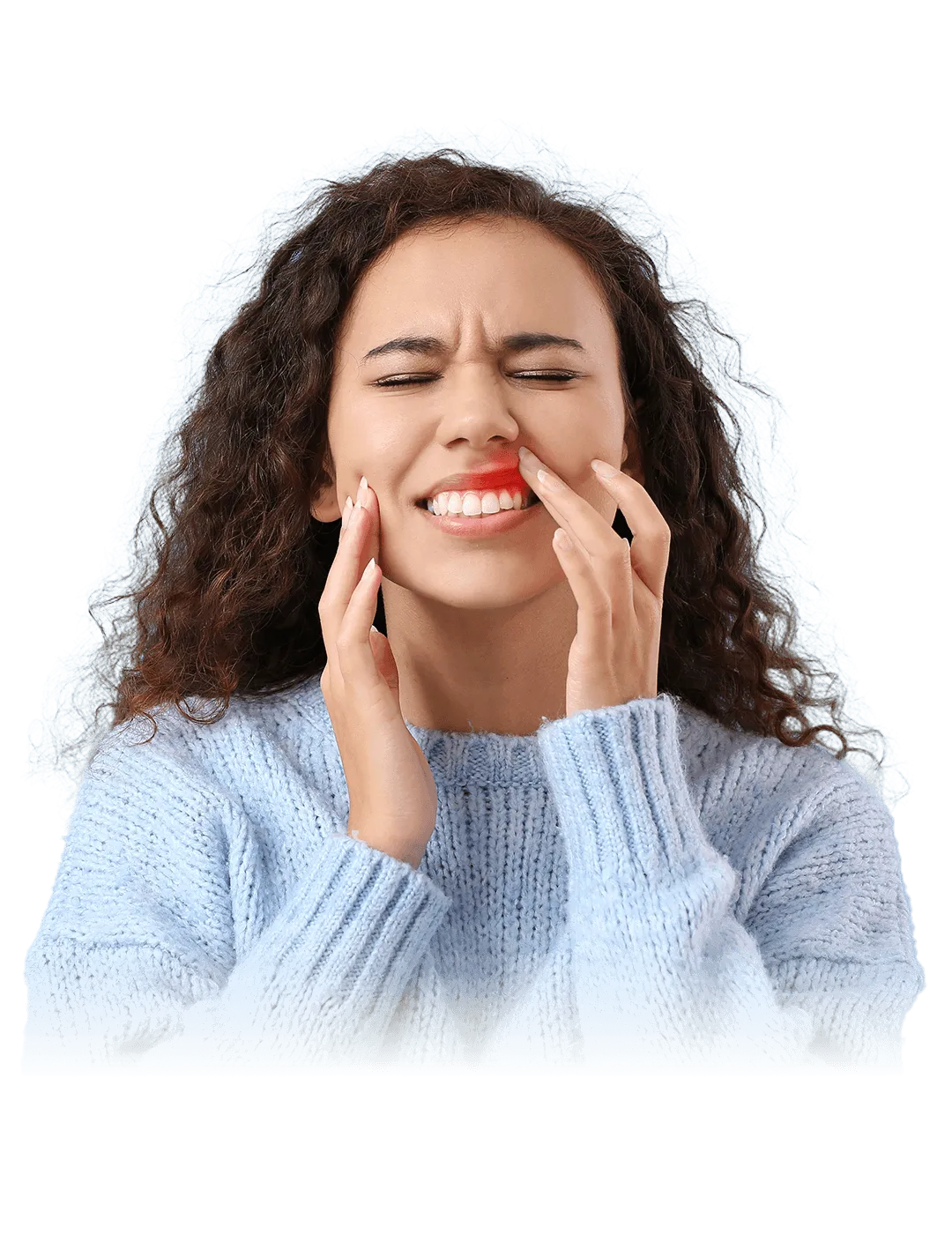 A woman with curly hair wearing a light blue sweater touches her cheek and winces in pain, suggesting a toothache. The background features a black pattern with blue and red diagonal lines.