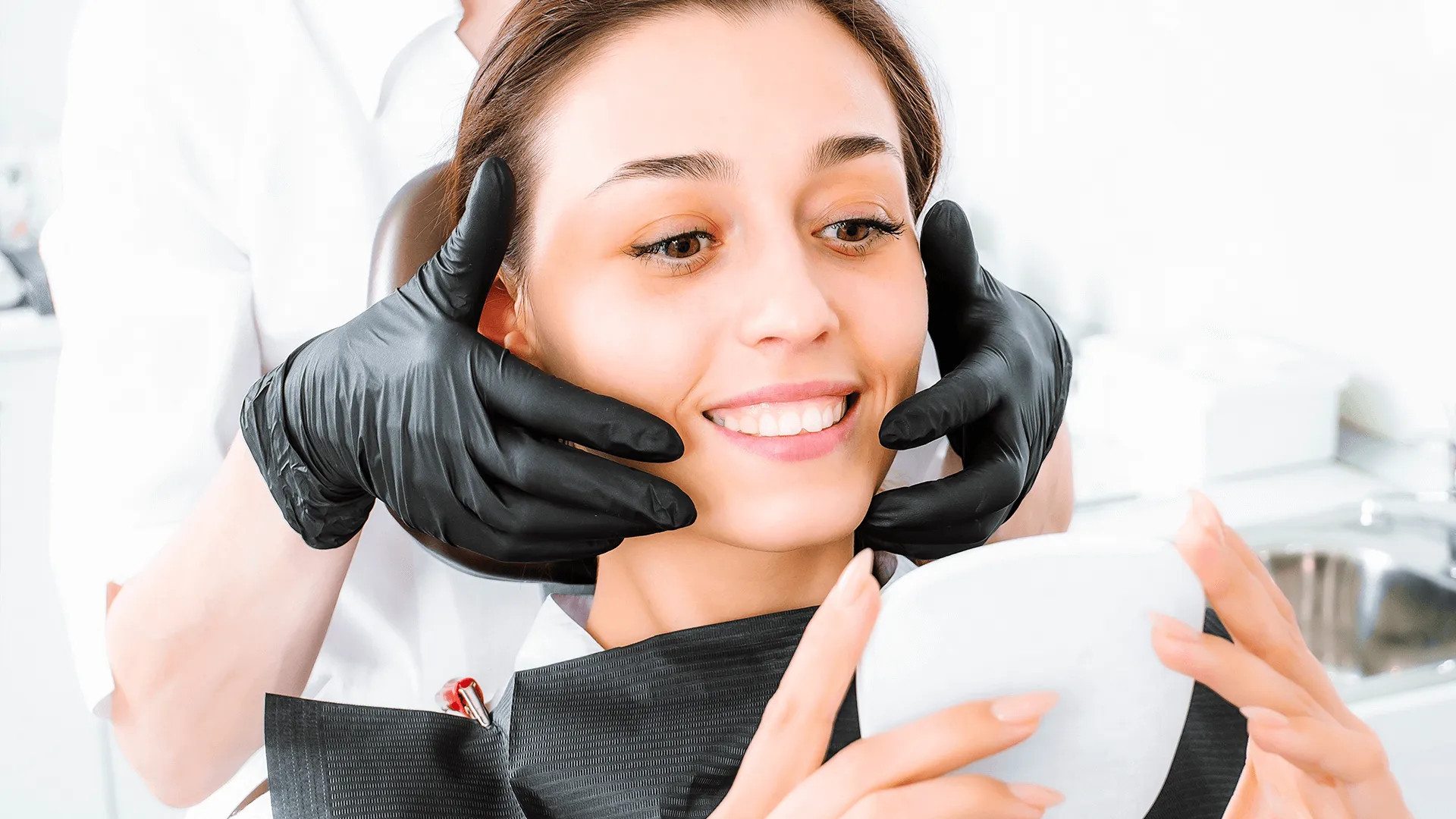 Installation of dental veneers. Dental implantation. Dental prosthetics. Teeth whitening.