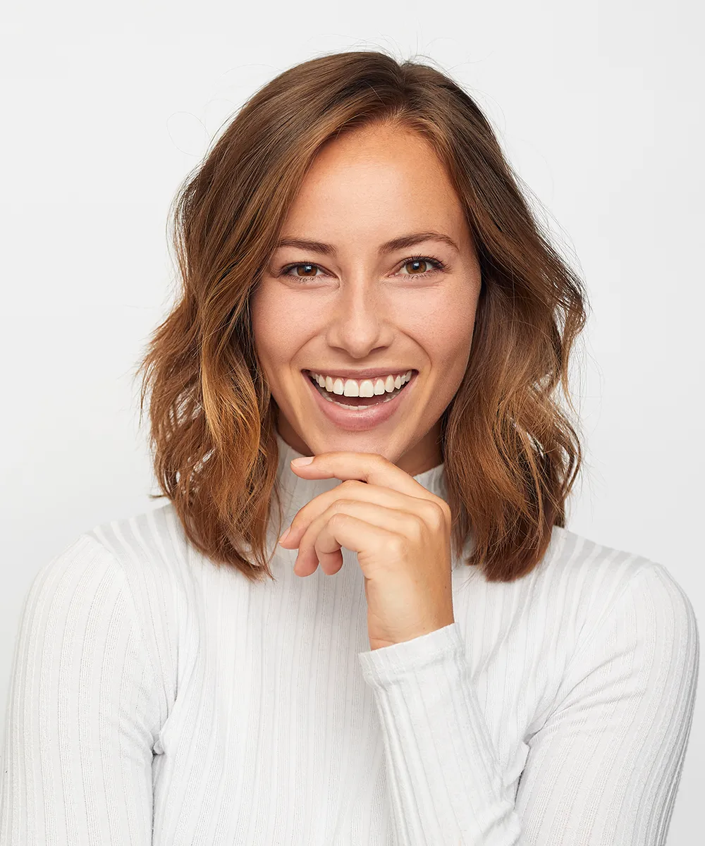 A woman smiling.